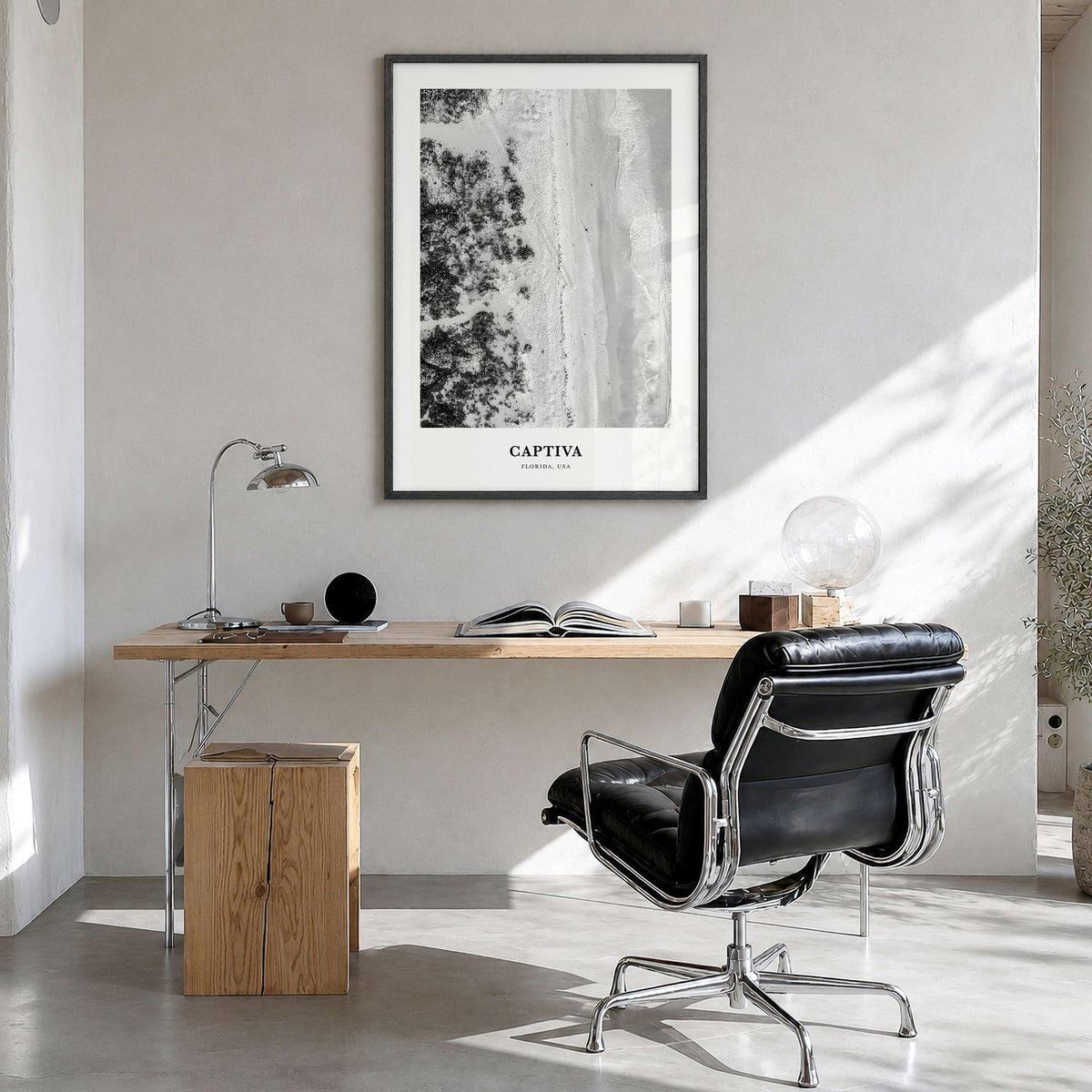 Captiva Classic No 1 Poster in a black wood frame, hanging in a bright home office