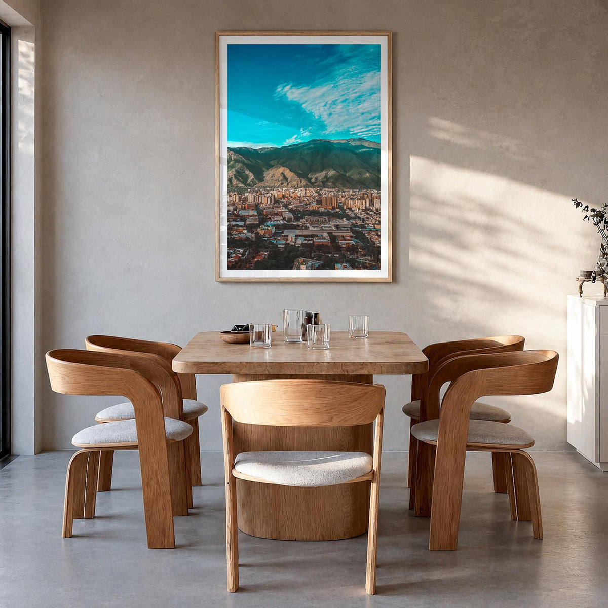 Caracas colorful photo poster of Venezuela – vertical wall art in natural wood frame with white border, hanging on wall