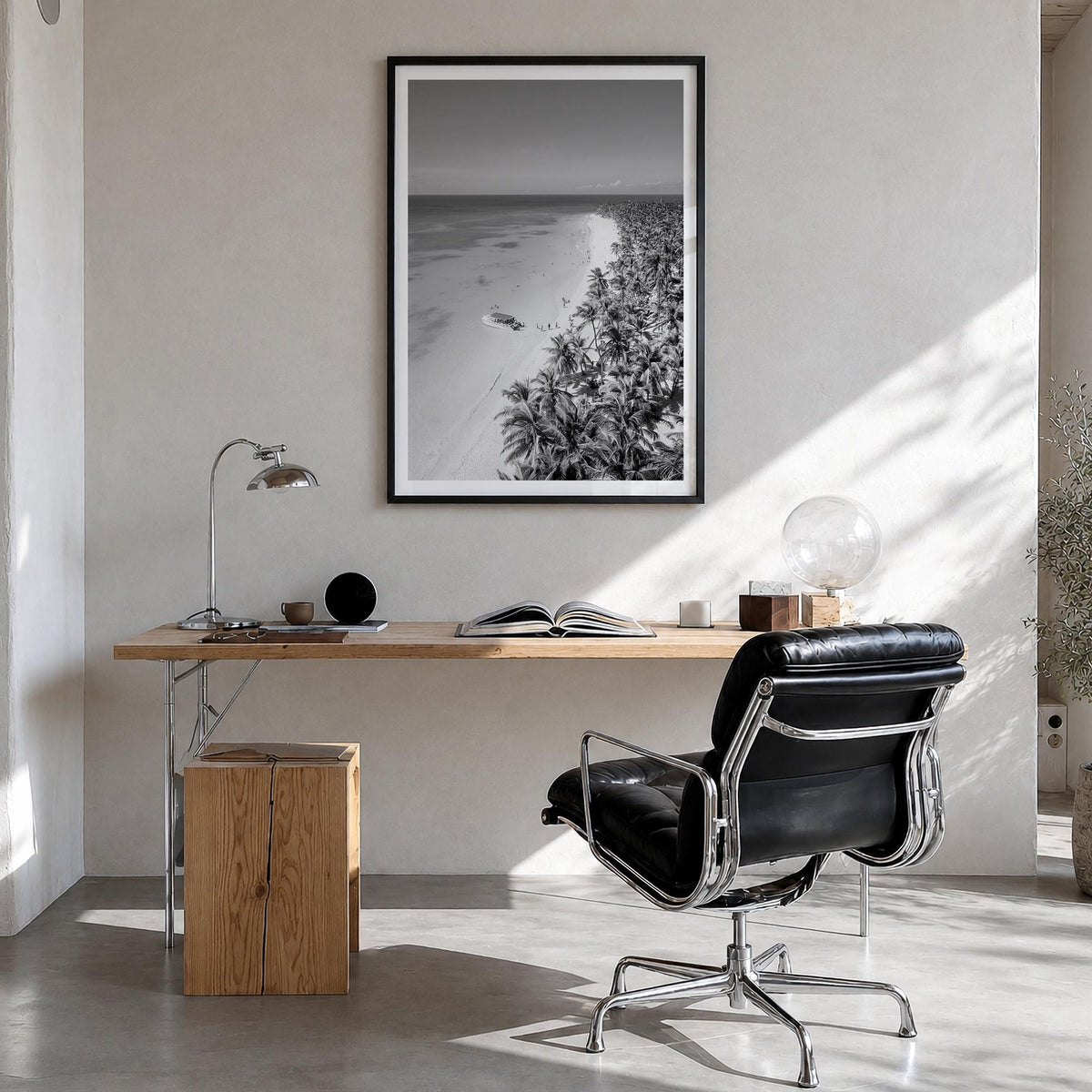 Caribbean black & white photo poster of World – vertical wall art in black wood frame with white border, hanging on wall