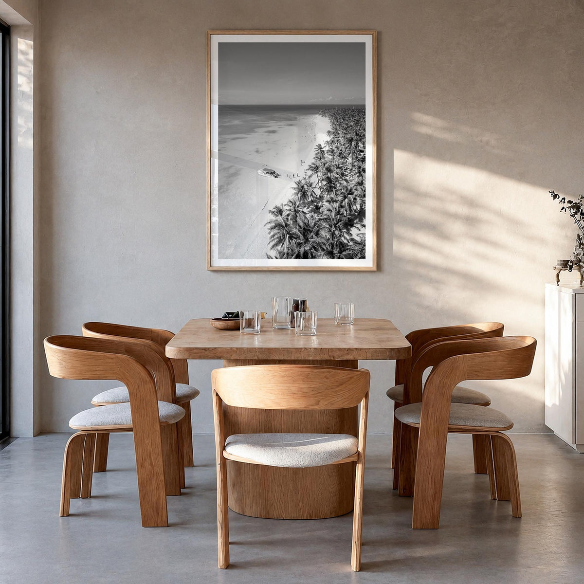 Caribbean black & white photo poster of World – vertical wall art in natural wood frame with white border, hanging on wall