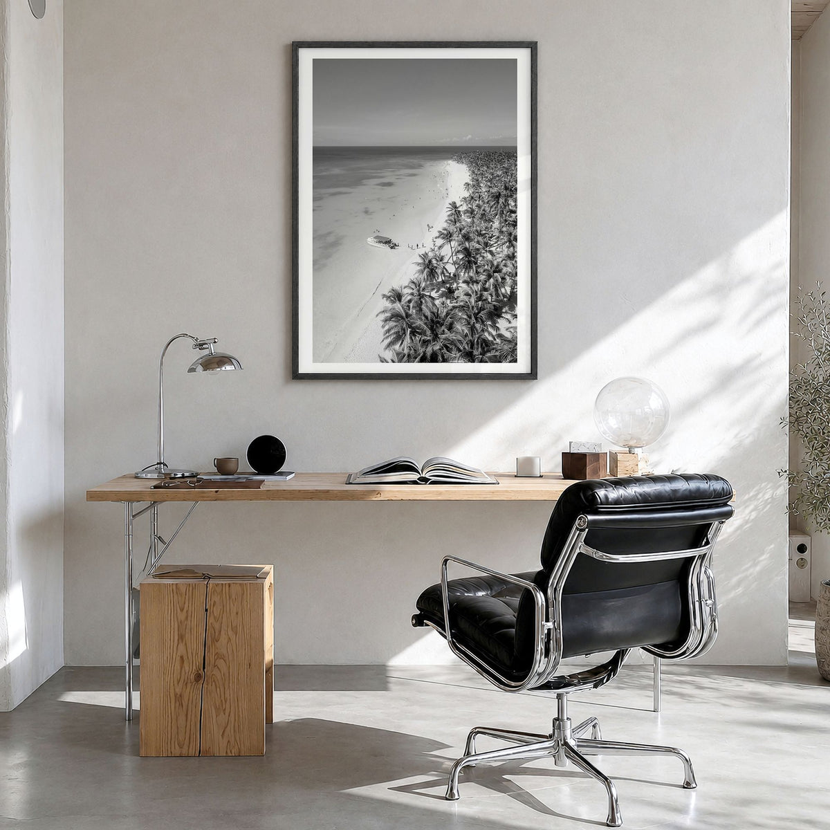 Caribbean Photo Poster in a black wood frame, hanging in a bright home office, white border