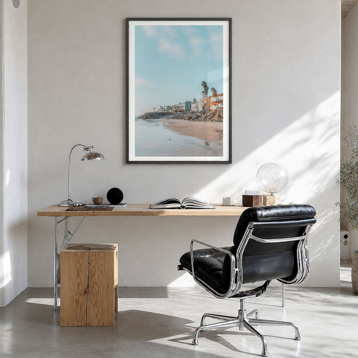 Carlsbad Photo No 1 Poster in a black wood frame, hanging in a bright home office, white border