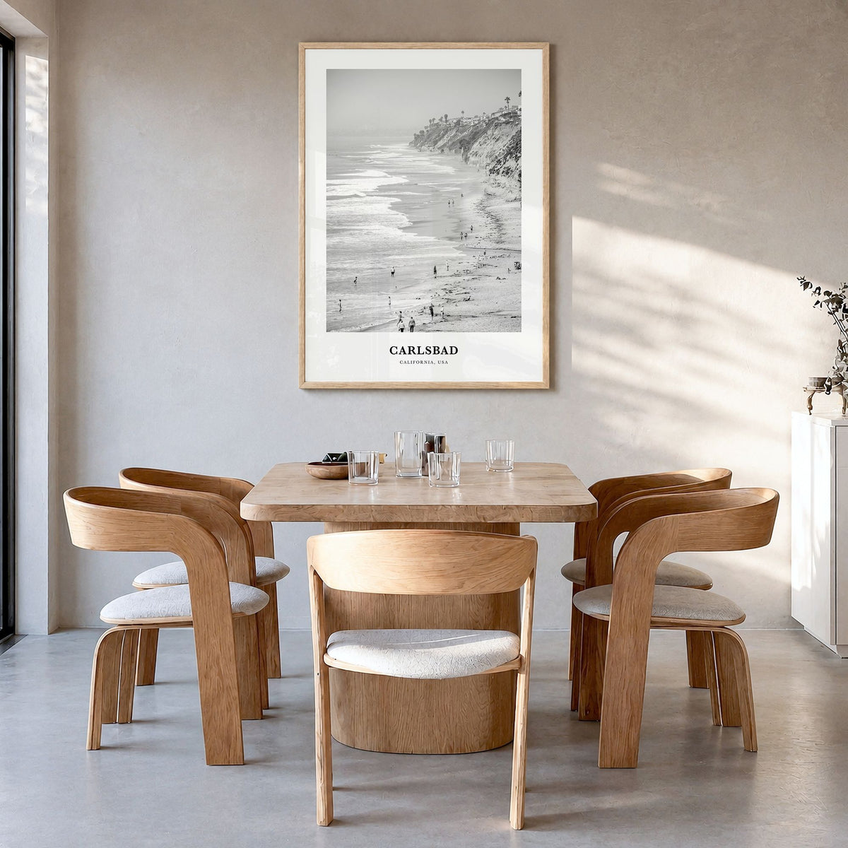 Carlsbad Classic No 1 Poster in a natural wood frame, hanging in a dining room