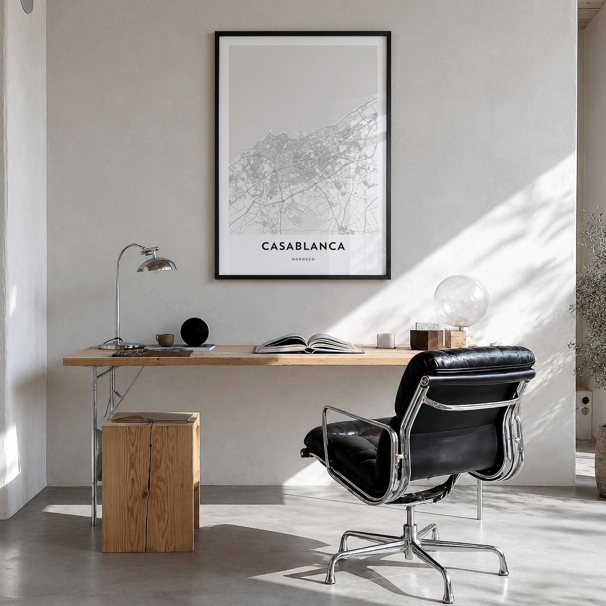 Casablanca black & white map poster of Morocco – vertical wall art in black wood frame, hanging on wall