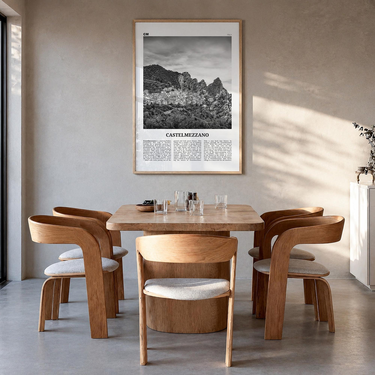 Castelmezzano black & white newspaper poster of Italy – vertical wall art in natural wood frame, hanging on wall