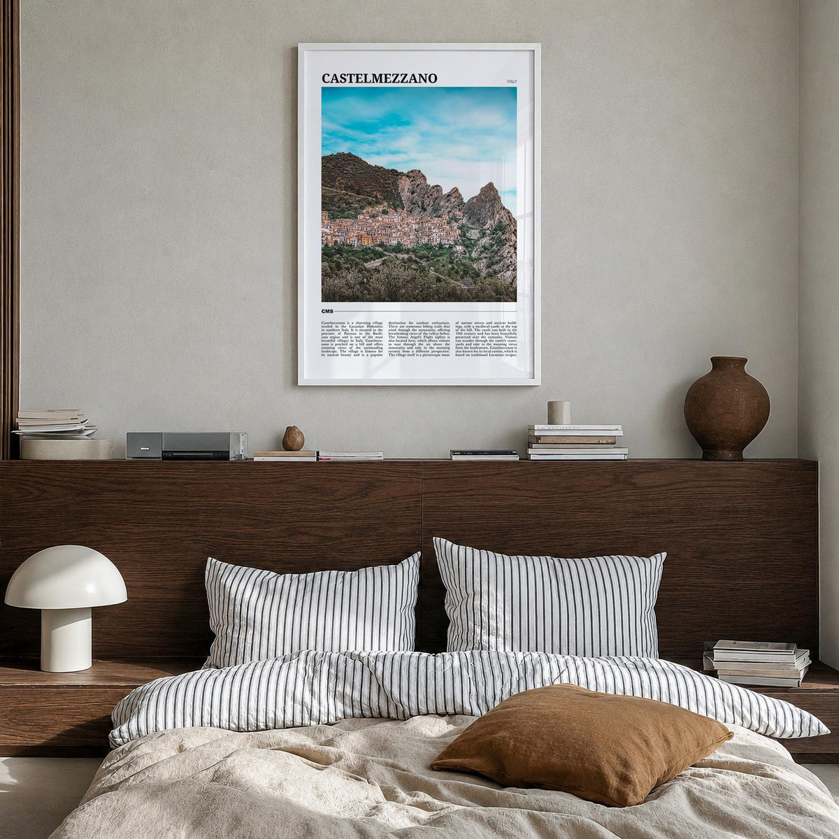 Castelmezzano colorful travel poster of Italy – vertical wall art in white wood frame, hanging on wall