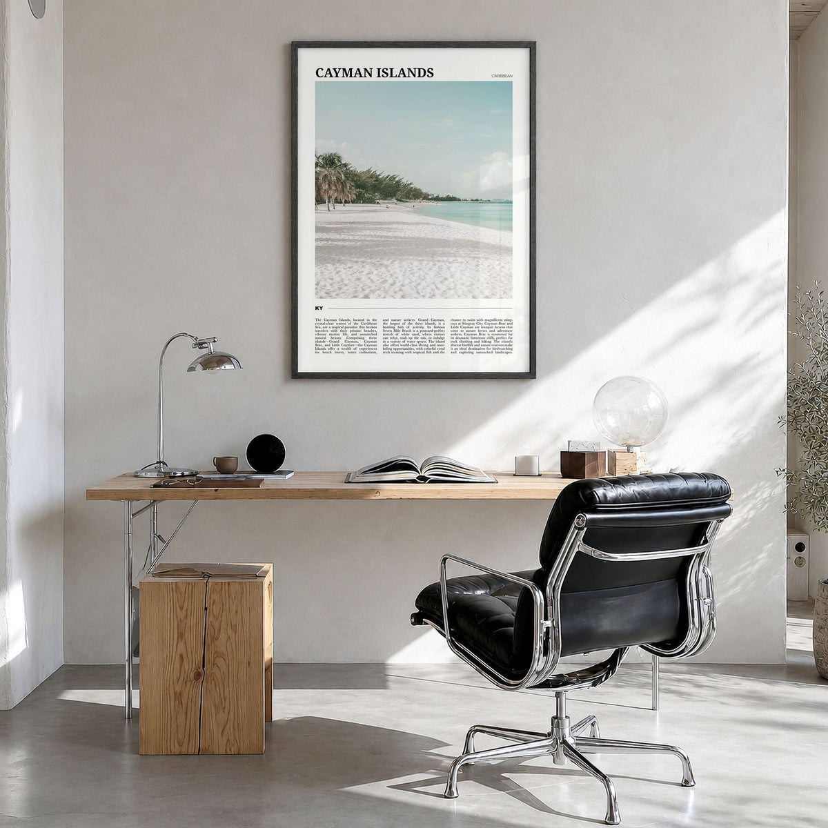 Cayman Islands Travel Poster in a black wood frame, hanging in a bright home office
