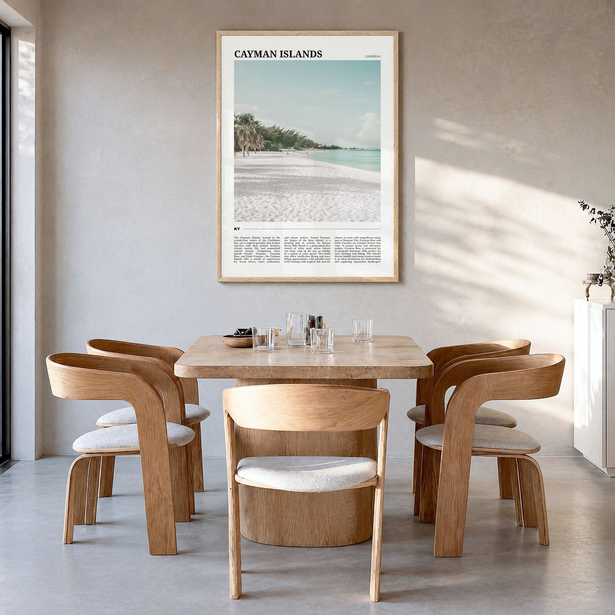 Cayman Islands Travel Poster in a natural wood frame, hanging in a dining room