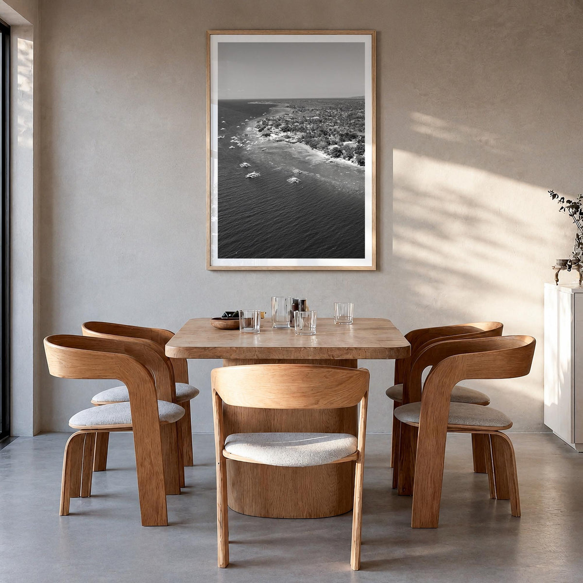 Cebu black & white photo poster of Philippines – vertical wall art in natural wood frame with white border, hanging on wall