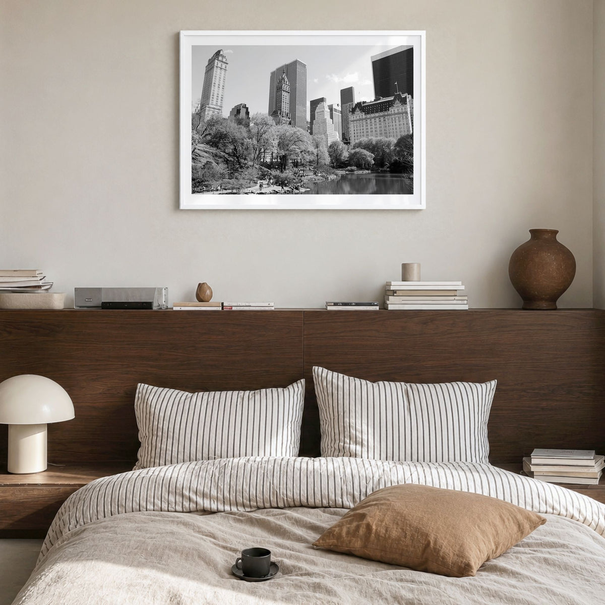 Central Park Photo Poster in a white wood frame, hanging in a bedroom, white border