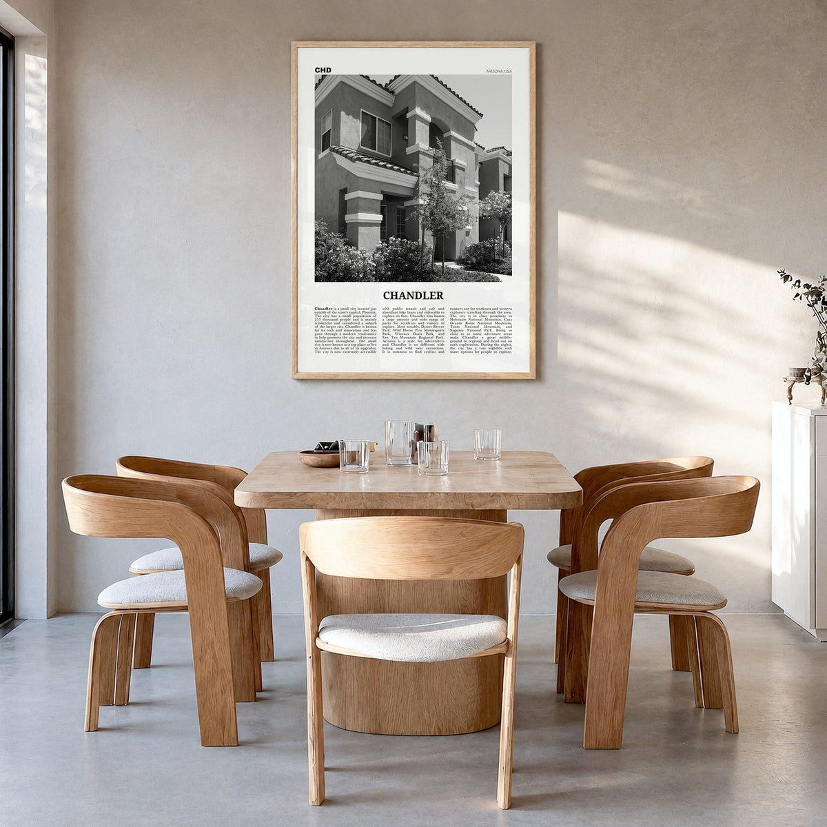 Chandler Newspaper Poster in a natural wood frame, hanging in a dining room