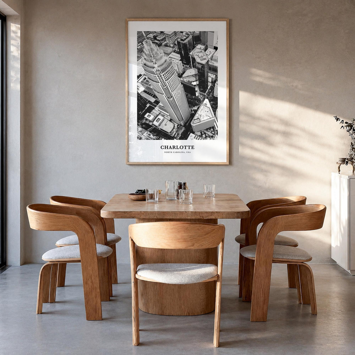 Charlotte no. 1 black & white classic poster of North Carolina, USA – vertical wall art in natural wood frame, hanging on wal