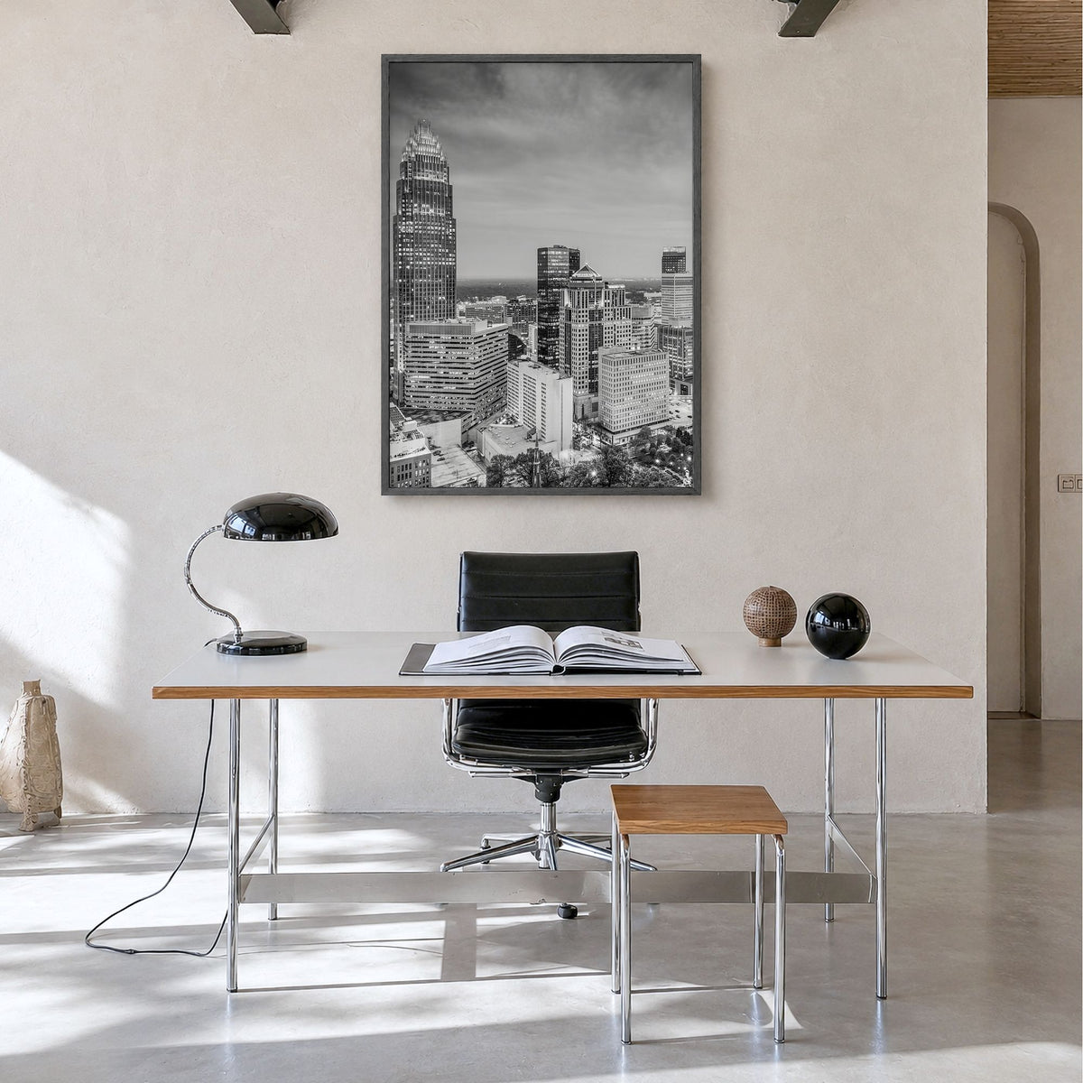 Charlotte Photo No 2 Poster in a black wood frame, hanging in a minimalist home office, full image (no border)