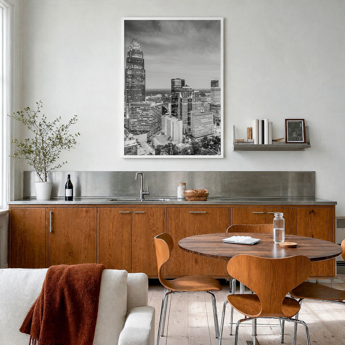 Charlotte Photo No 2 Poster in a white wood frame, hanging in a kitchen with a dining area, full image (no border)