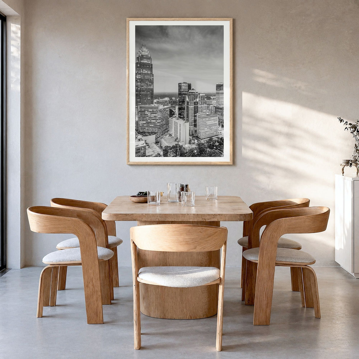 Charlotte Photo No 2 Poster in a natural wood frame, hanging in a dining room, white border