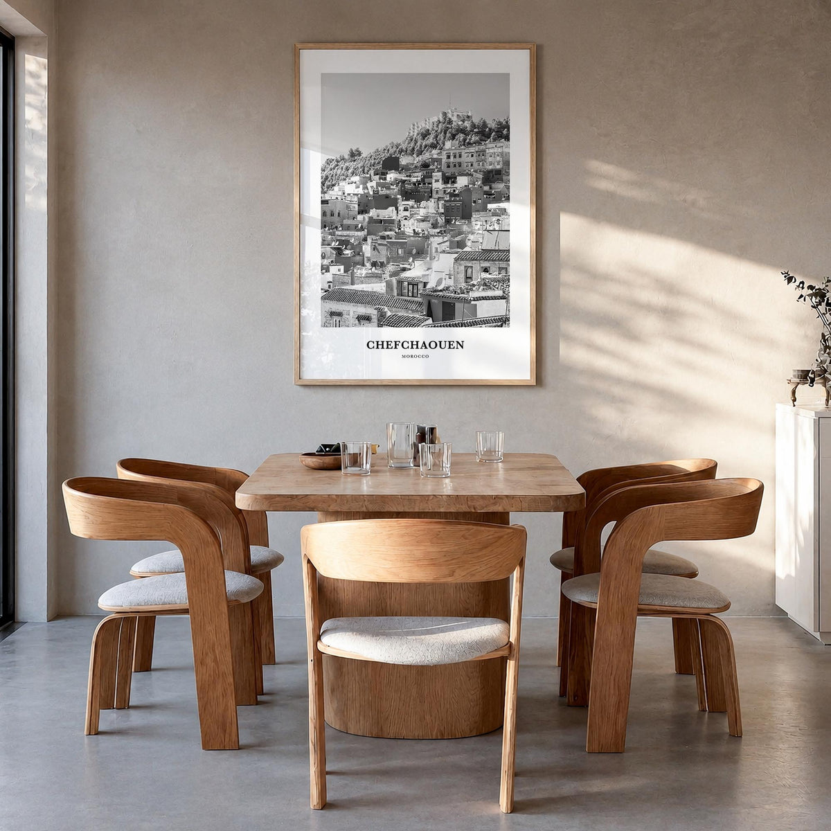 Chefchaouen black & white classic poster of Morocco – vertical wall art in natural wood frame, hanging on wall