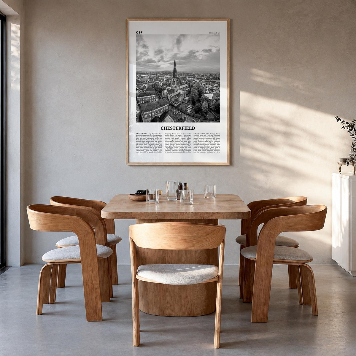 Chesterfield black & white newspaper poster of United Kingdom – vertical wall art in natural wood frame, hanging on wall