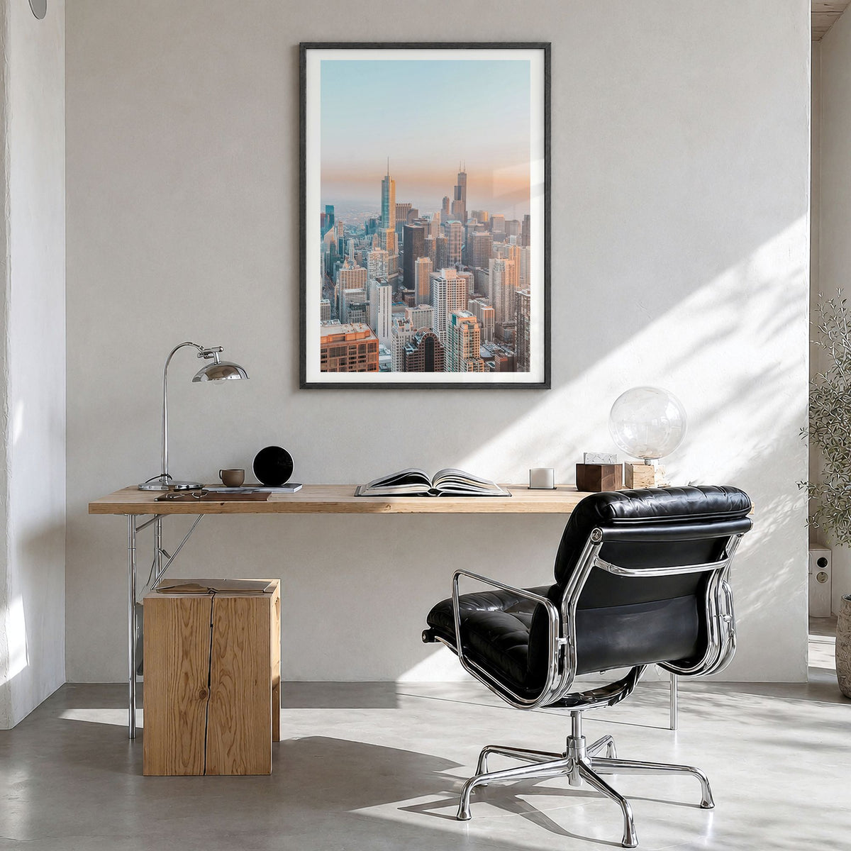 Chicago Photo No 1 Poster in a black wood frame, hanging in a bright home office, white border