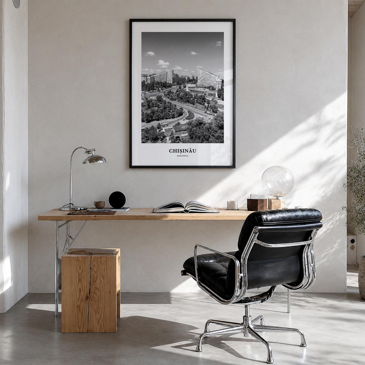 Chișinău black & white classic poster of Moldova – vertical wall art in black wood frame, hanging on wall