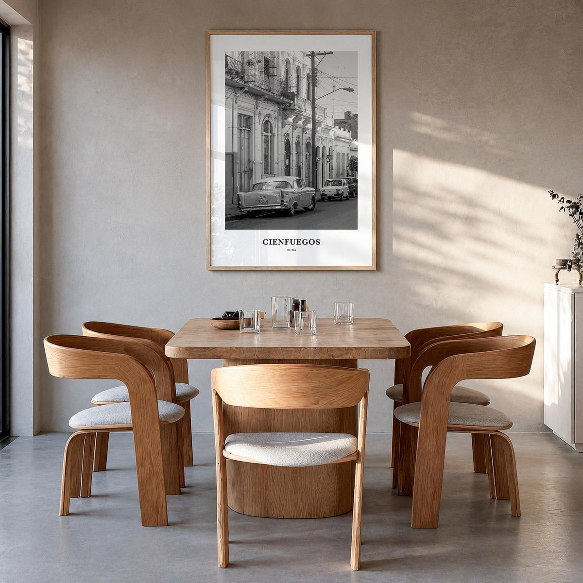Cienfuegos black & white classic poster of Cuba – vertical wall art in natural wood frame, hanging on wall