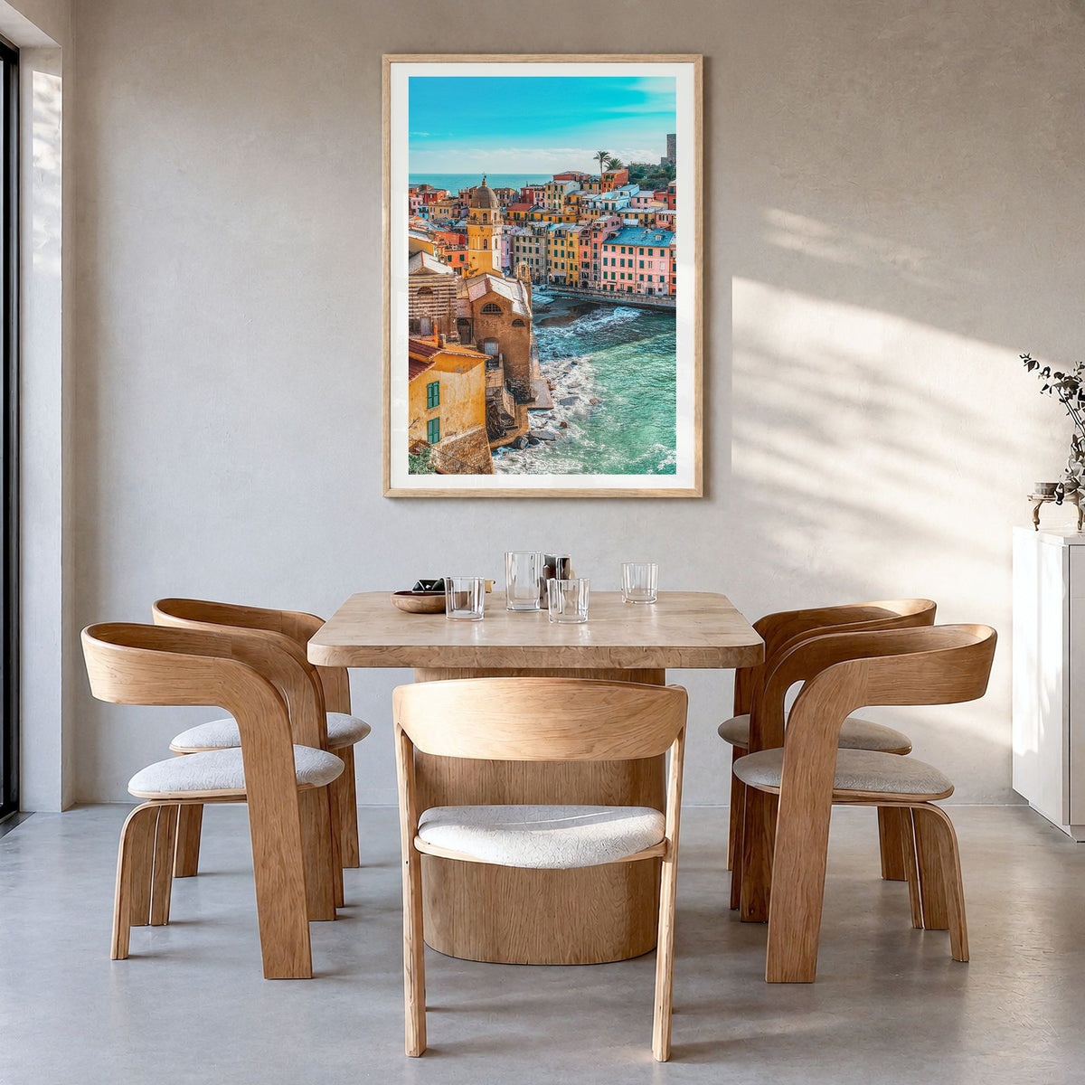 Cinque Terre Photo No 3 Poster in a natural wood frame, hanging in a dining room, white border