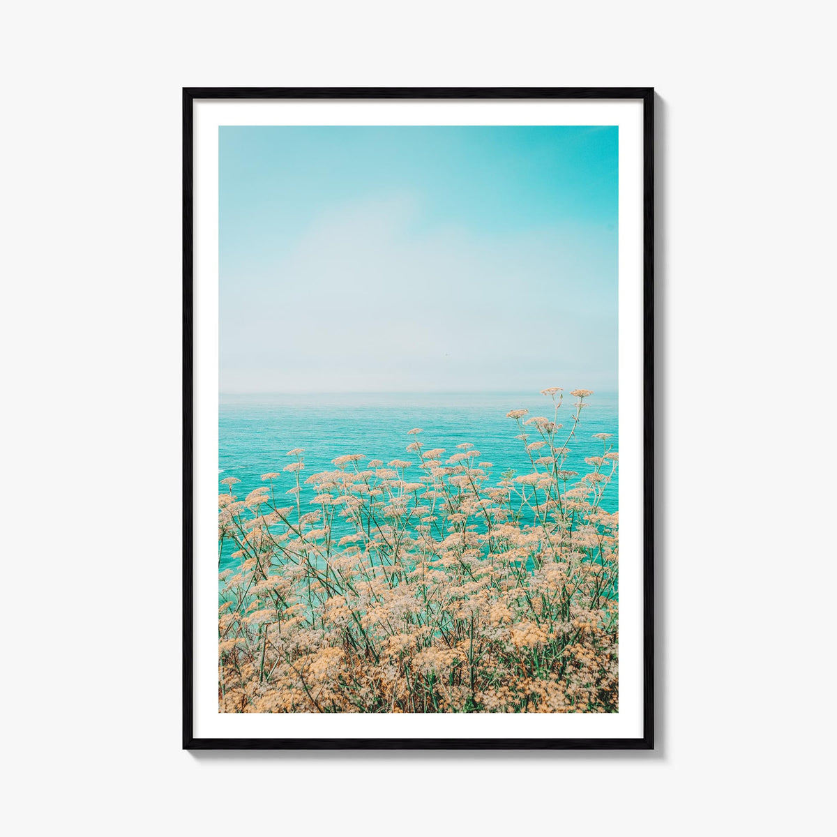 Clear Sky Yellow Flowers colorful photo poster – vertical wall art, unframed print shown in interior mockup