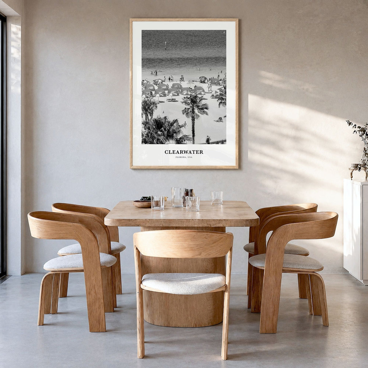 Clearwater Classic Poster in a natural wood frame, hanging in a dining room