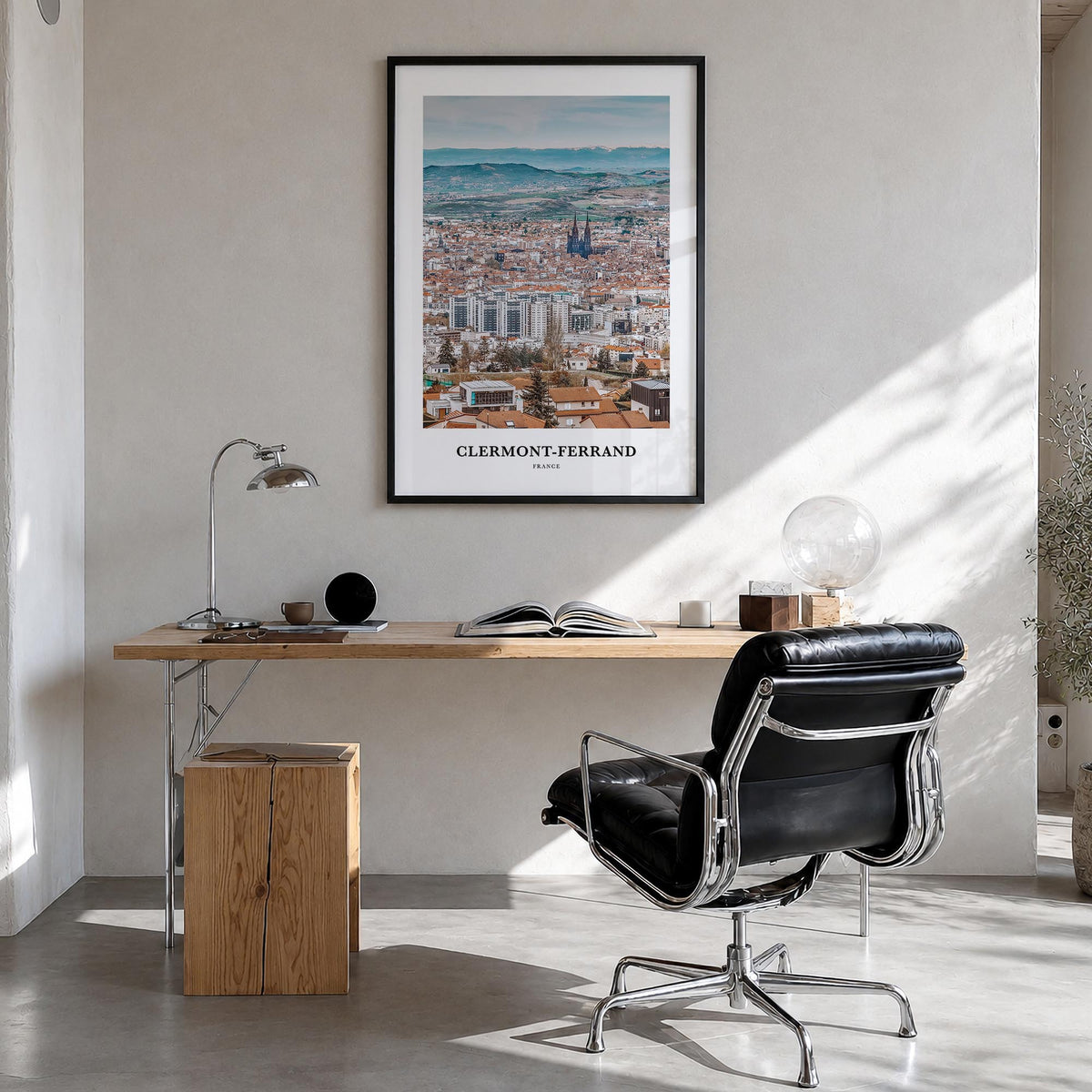 Clermont-Ferrand colorful classic poster of France – vertical wall art in black wood frame, hanging on wall