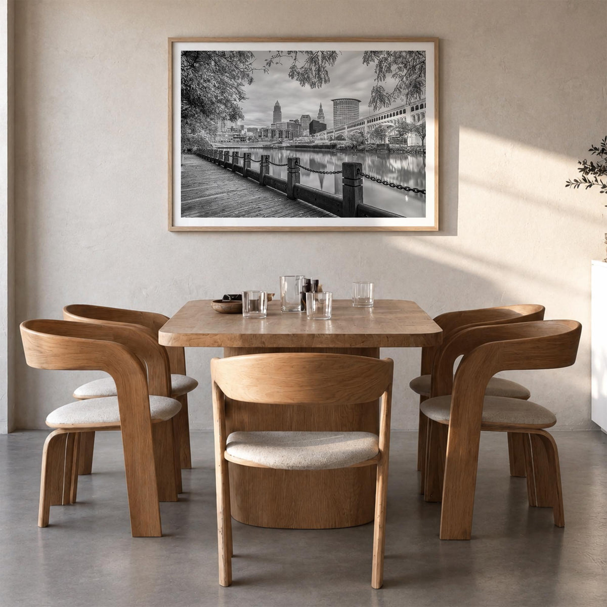 Cleveland black & white photo poster of Ohio, USA – horizontal wall art in natural wood frame with white border, hanging on w