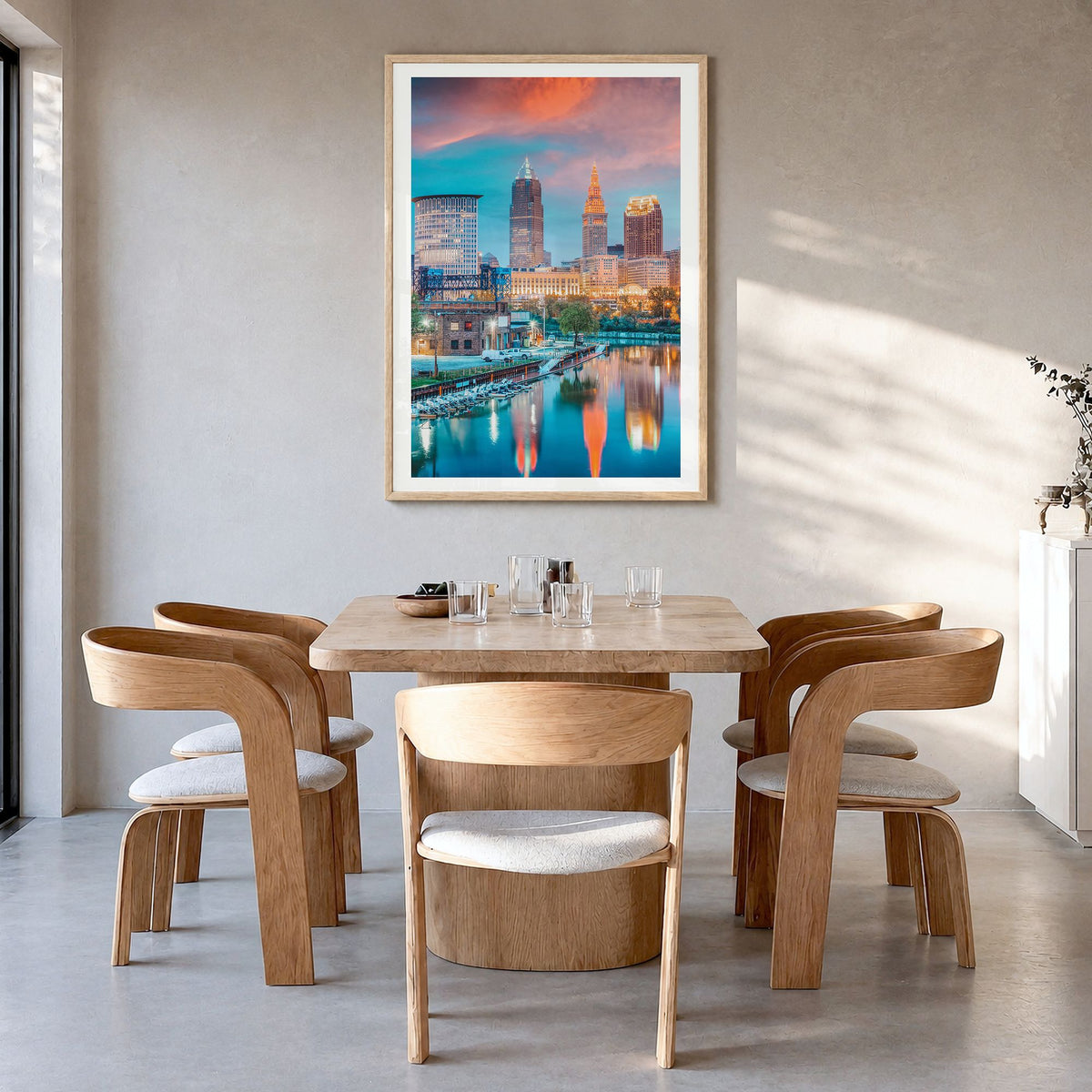 Cleveland Photo No 1 Poster in a natural wood frame, hanging in a dining room, white border