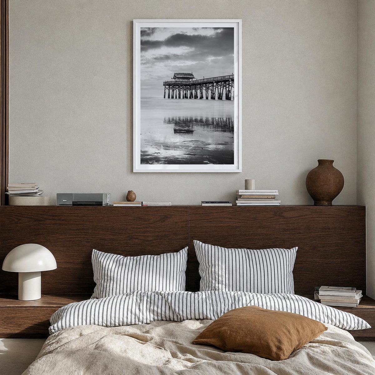 Cocoa Beach black & white photo poster of Florida, USA – vertical wall art in white wood frame with white border, hanging on