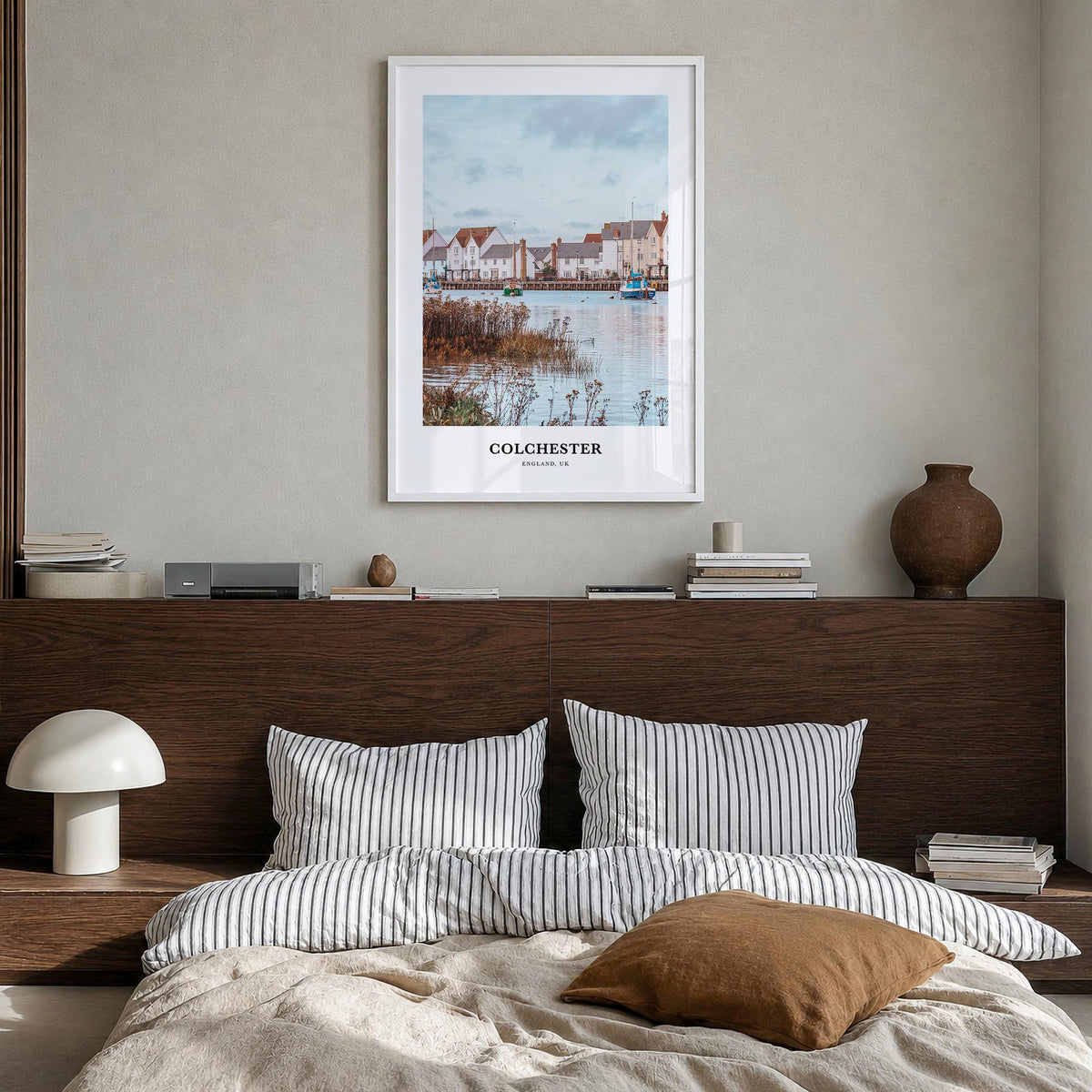 Colchester colorful classic poster of United Kingdom – vertical wall art in white wood frame, hanging on wall