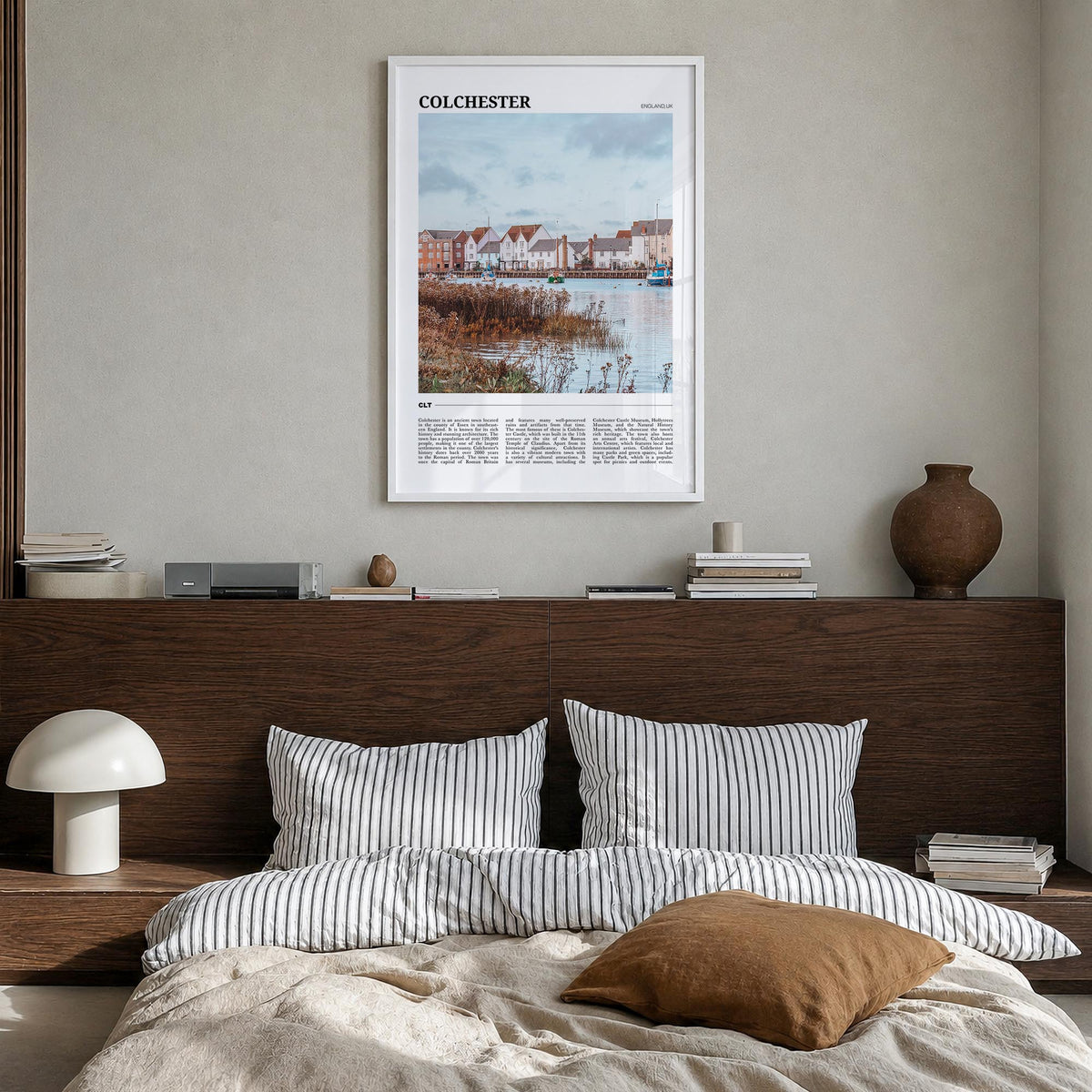 Colchester colorful travel poster of United Kingdom – vertical wall art in white wood frame, hanging on wall
