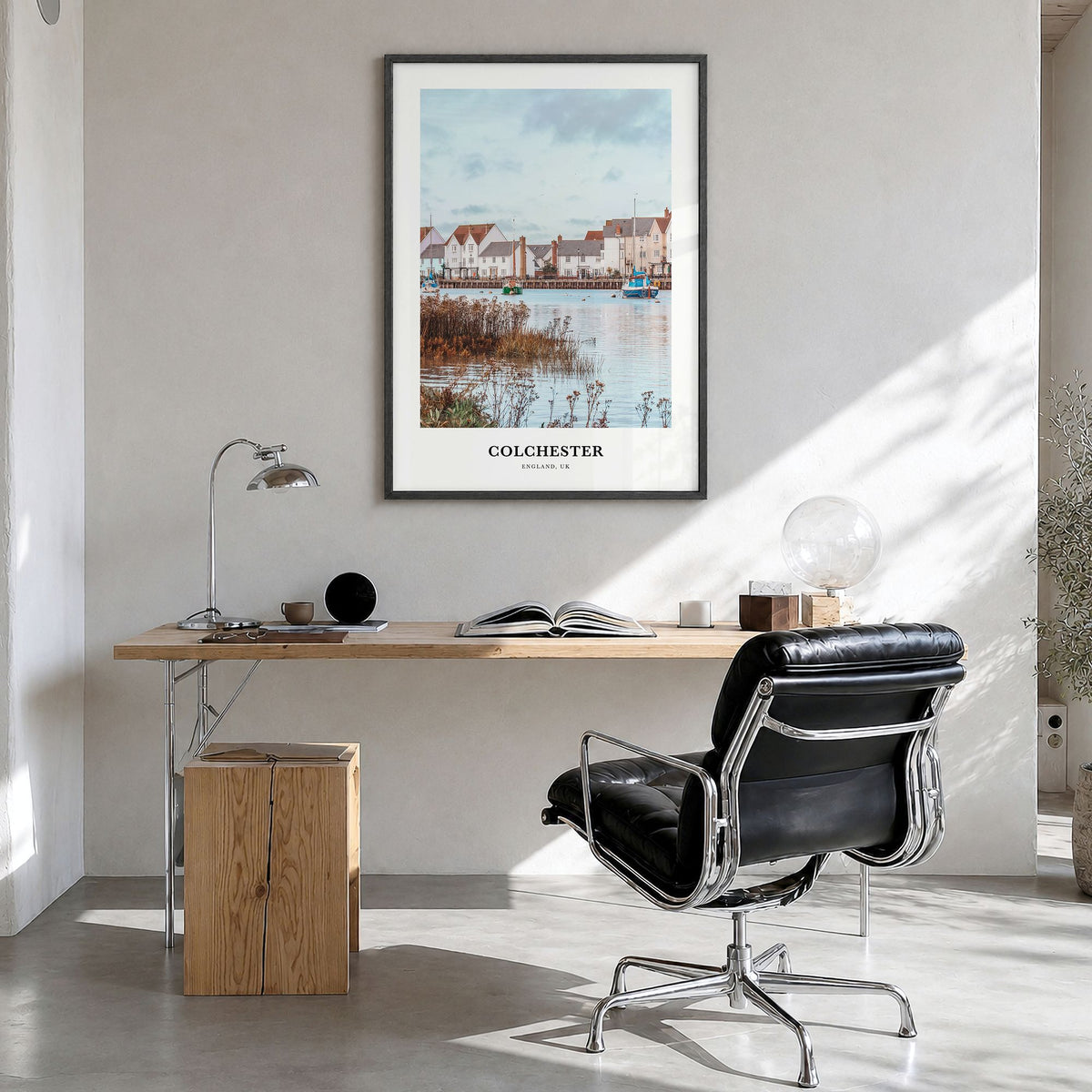 Colchester Classic Poster in a black wood frame, hanging in a bright home office