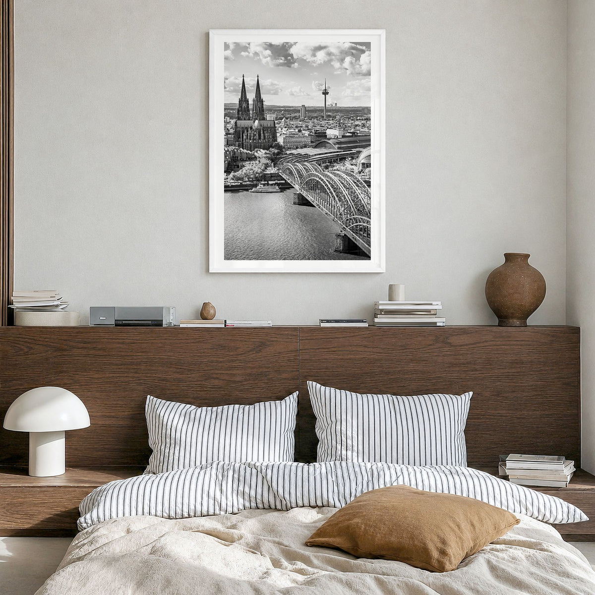 Cologne Photo Poster in a white wood frame, hanging in a bedroom, white border