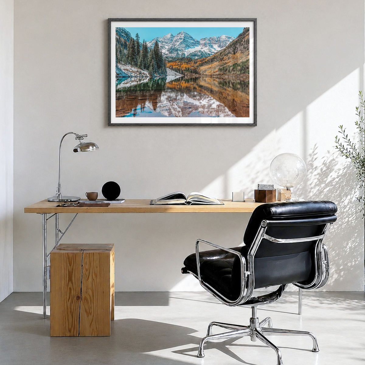 Colorado Photo Poster in a black wood frame, hanging in a bright home office, white border