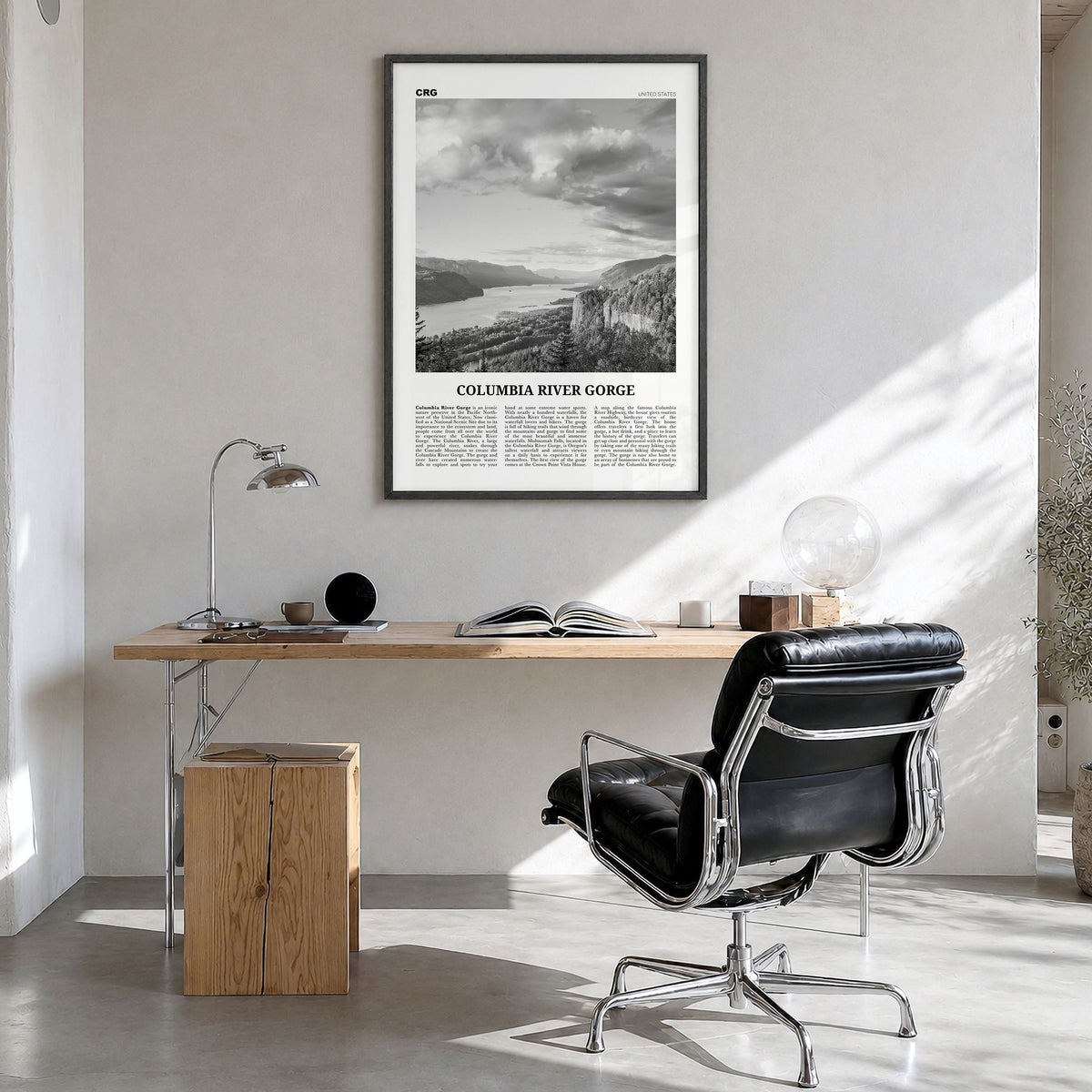 Columbia River Gorge Newspaper Poster in a black wood frame, hanging in a bright home office