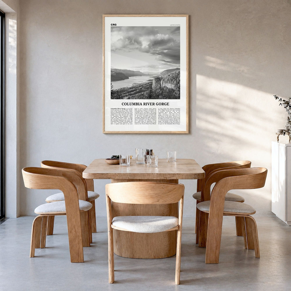 Columbia River Gorge Newspaper Poster in a natural wood frame, hanging in a dining room