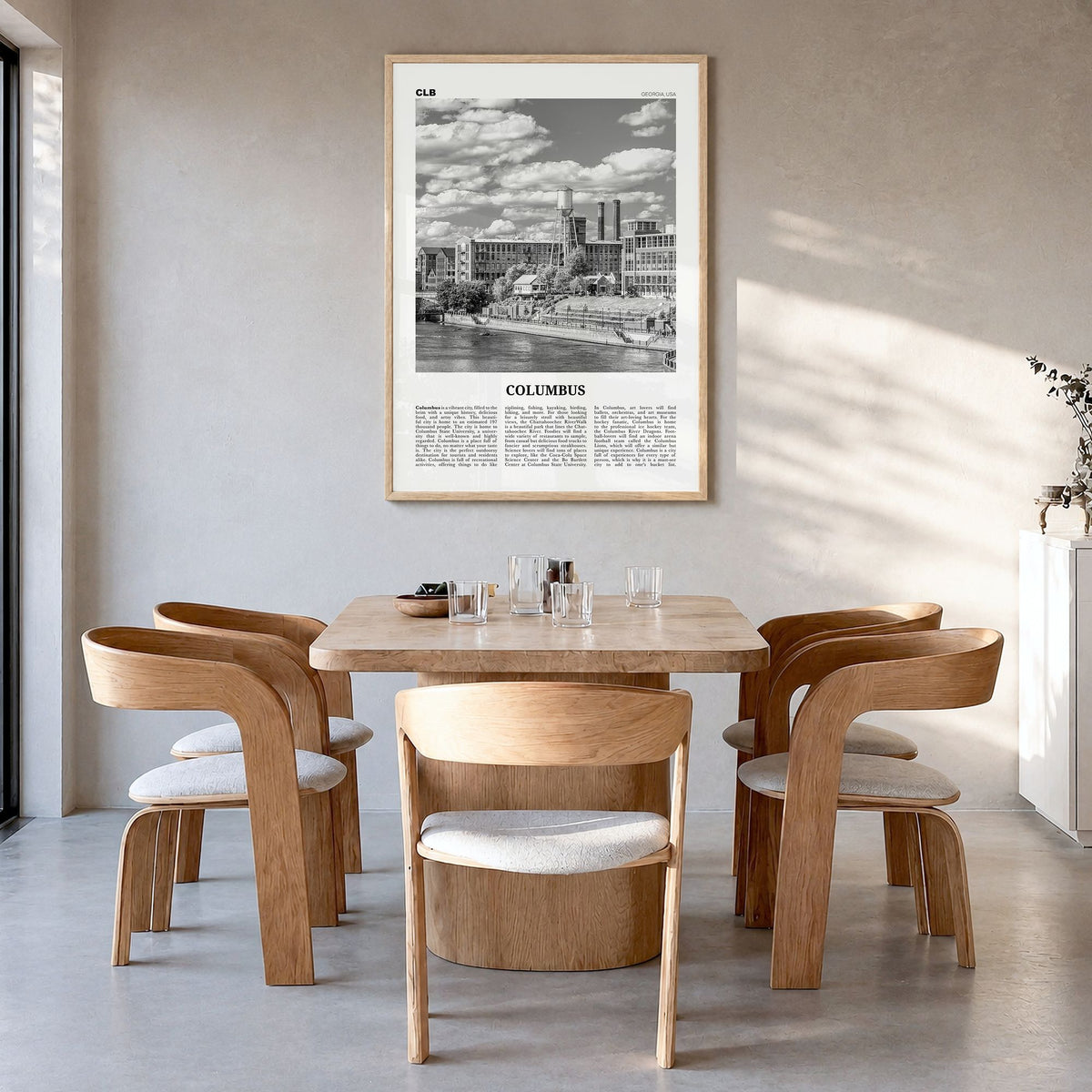 Columbus, Georgia Newspaper Poster in a natural wood frame, hanging in a dining room