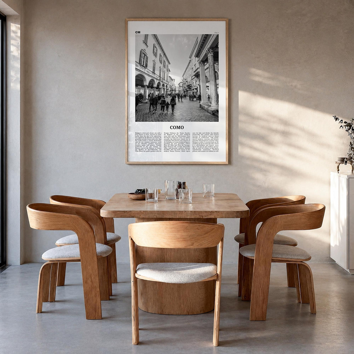 Como no. 2 black & white newspaper poster of Italy – vertical wall art in natural wood frame, hanging on wall