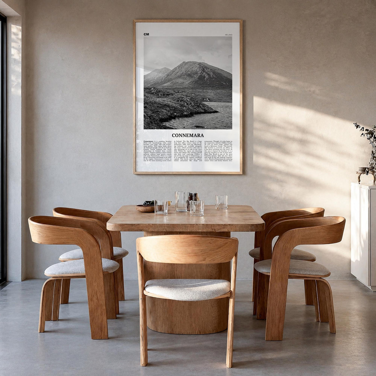Connemara black & white newspaper poster of Ireland – vertical wall art in natural wood frame, hanging on wall