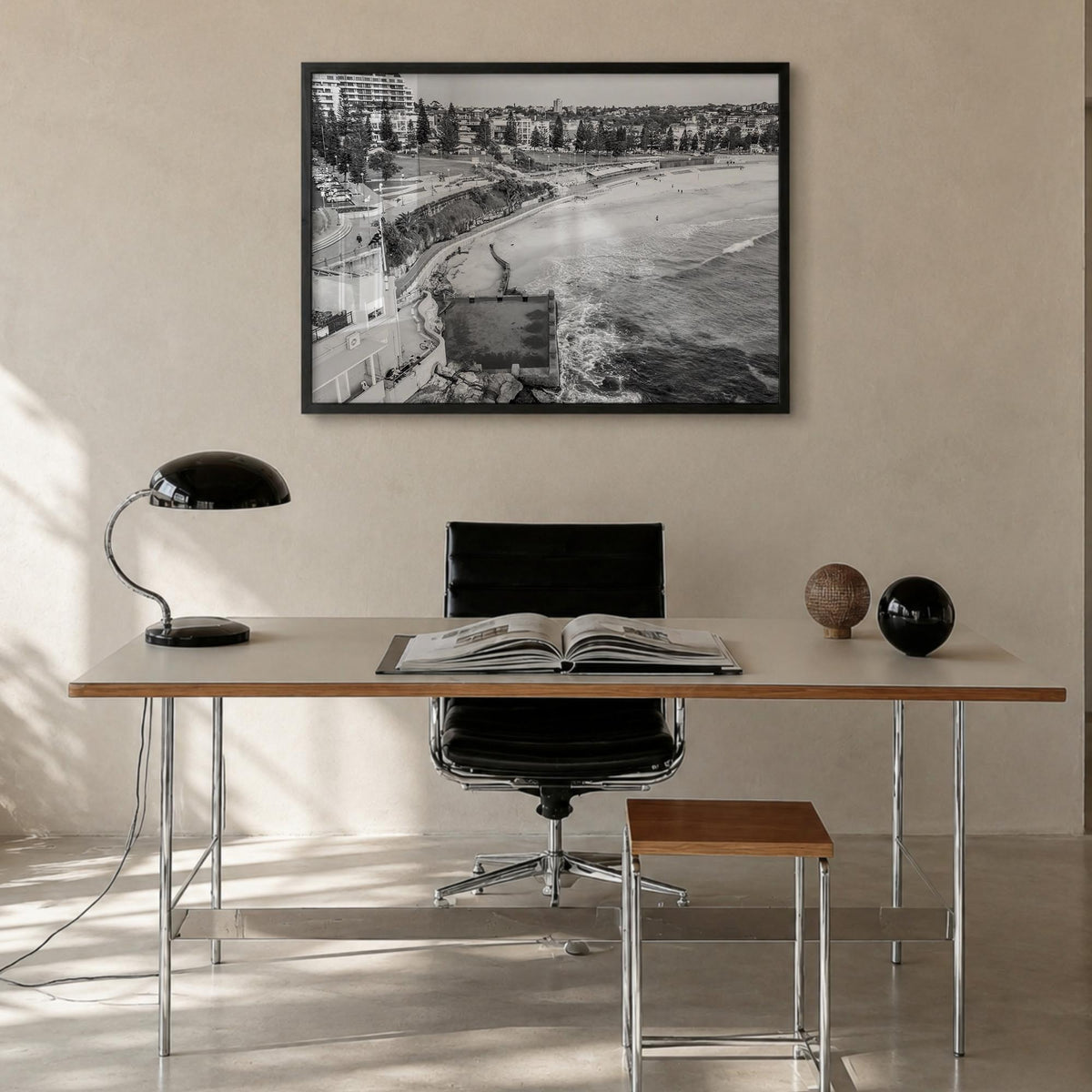 Coogee Beach black & white photo poster of Sydney, New South Wales – horizontal wall art in black wood frame, hanging on wall