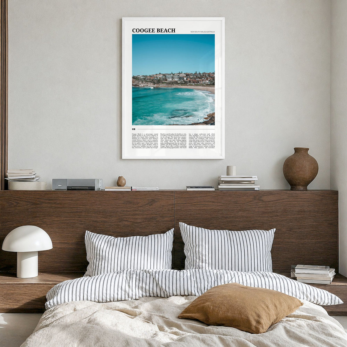 Coogee Beach Travel No 2 Poster in a white wood frame, hanging in a bedroom