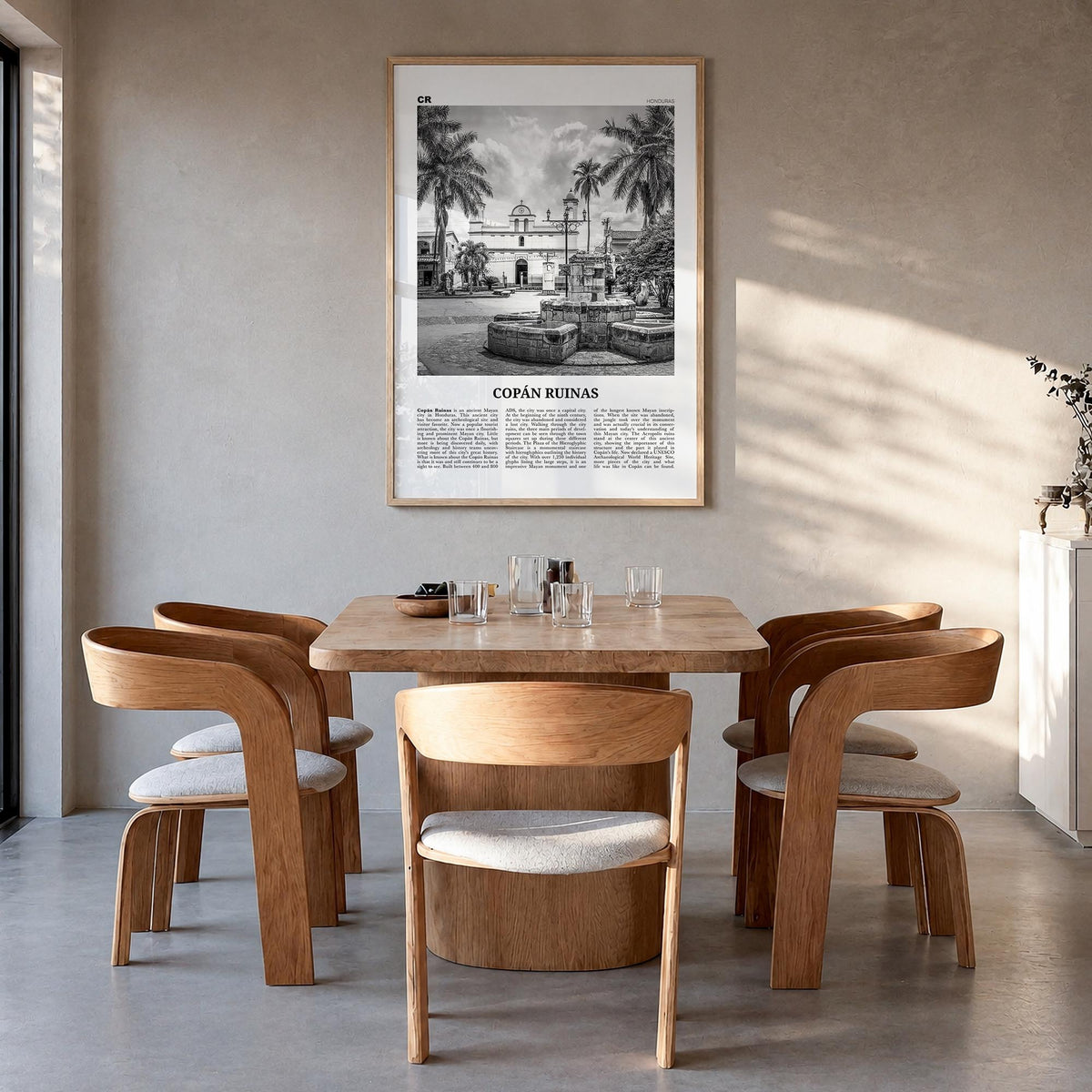 Copán Ruinas black & white newspaper poster of Honduras – vertical wall art in natural wood frame, hanging on wall