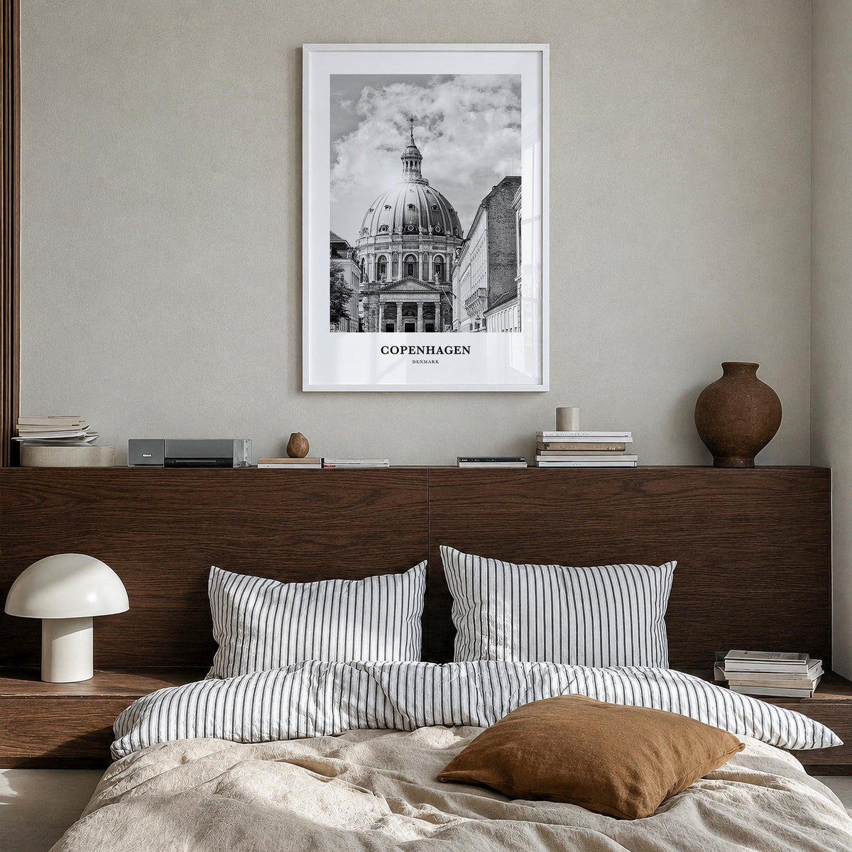 Copenhagen no. 2 black & white classic poster of Denmark – vertical wall art in white wood frame, hanging on wall