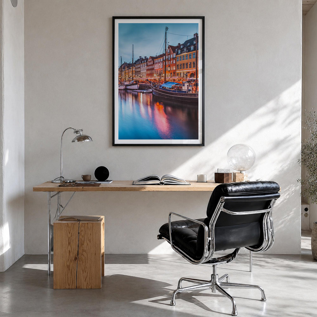 Copenhagen no. 2 colorful photo poster of Denmark – vertical wall art in black wood frame with white border, hanging on wall
