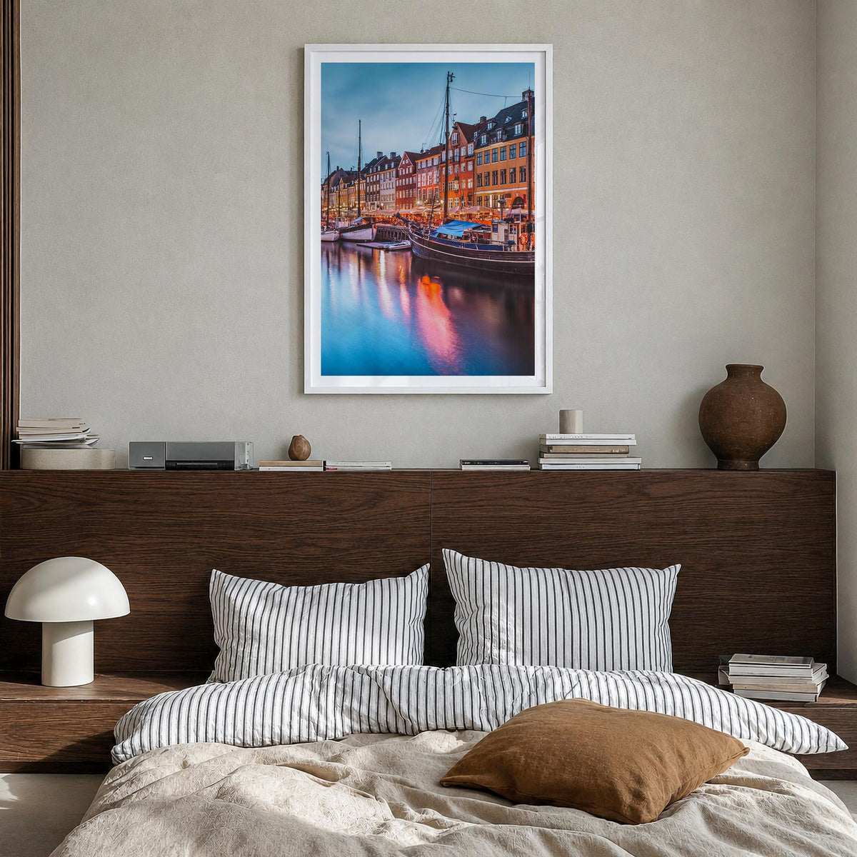 Copenhagen no. 2 colorful photo poster of Denmark – vertical wall art in white wood frame with white border, hanging on wall