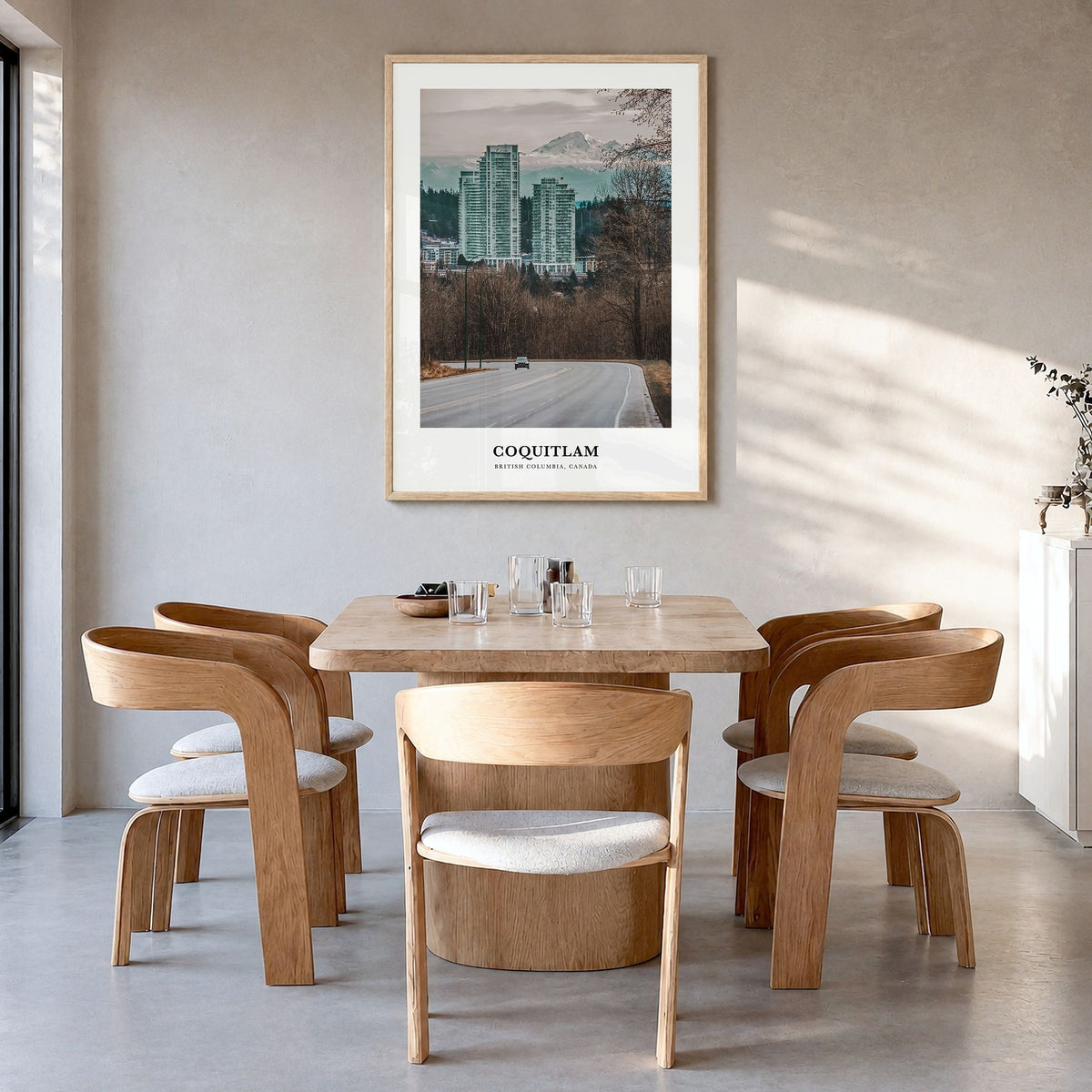 Coquitlam Classic No 2 Poster in a natural wood frame, hanging in a dining room