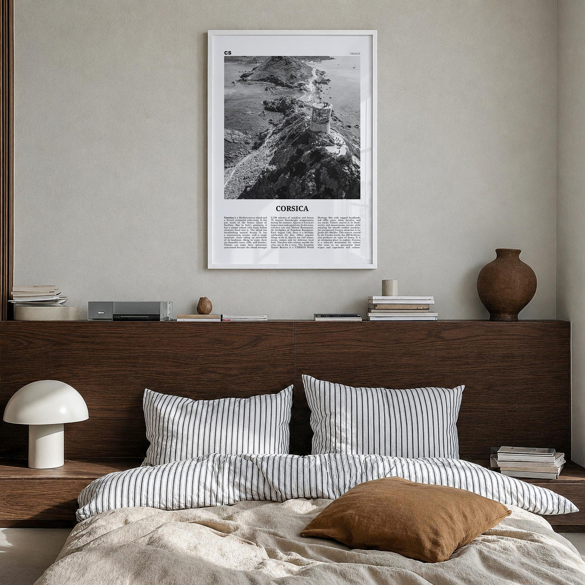 Corsica black & white newspaper poster of France – vertical wall art in white wood frame, hanging on wall