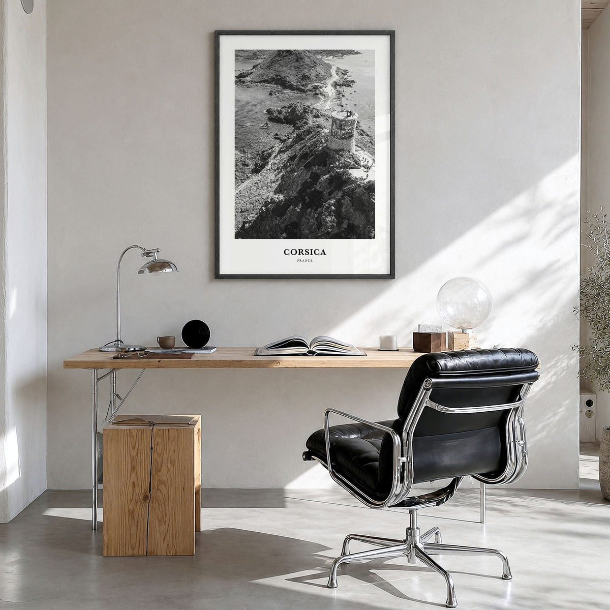 Corsica Classic Poster in a black wood frame, hanging in a bright home office